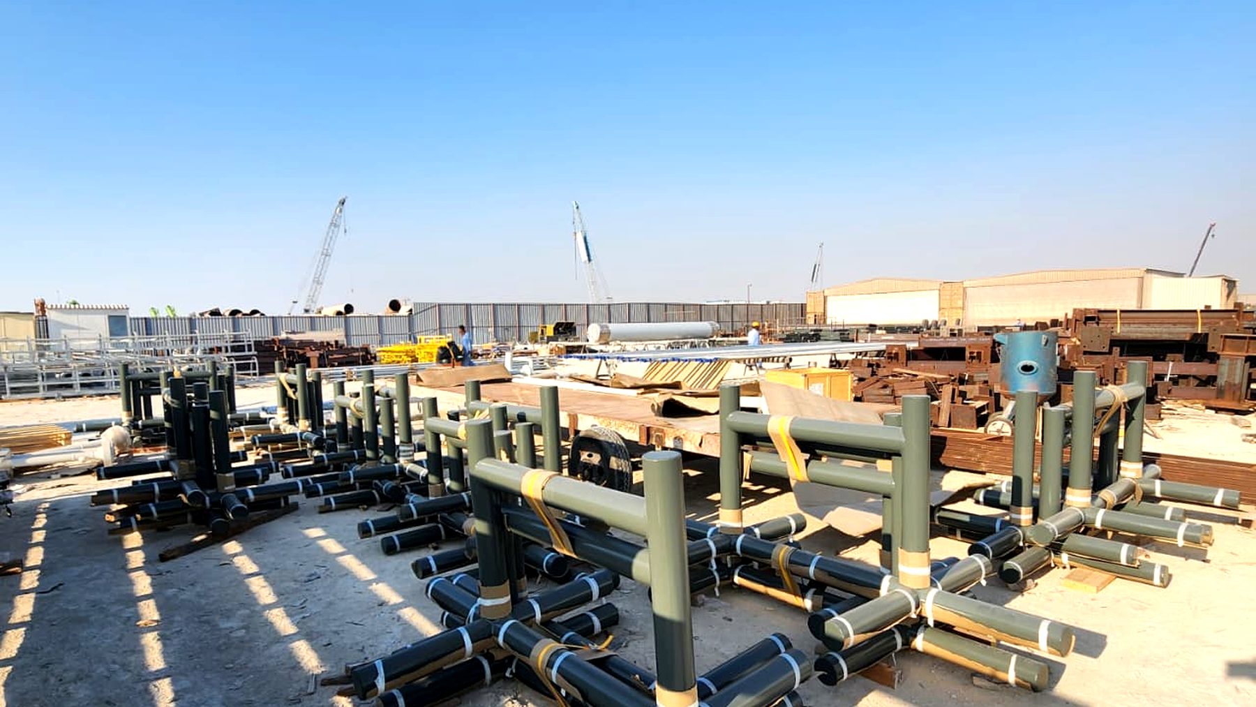 Fabricated pipe supports laid out in the Al Abyad yard