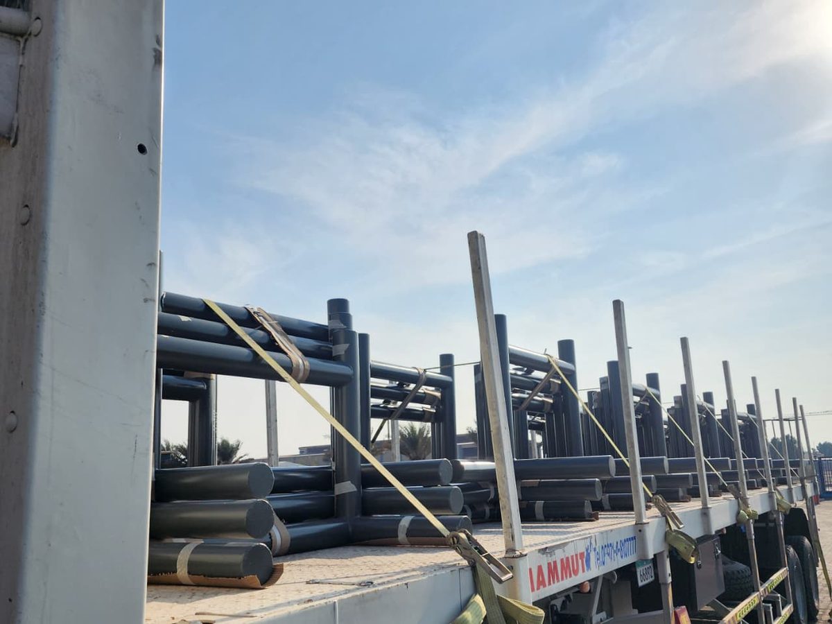 Fabricated sections loaded on a trailer for transport to site